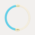 a blue and white circle with gold details