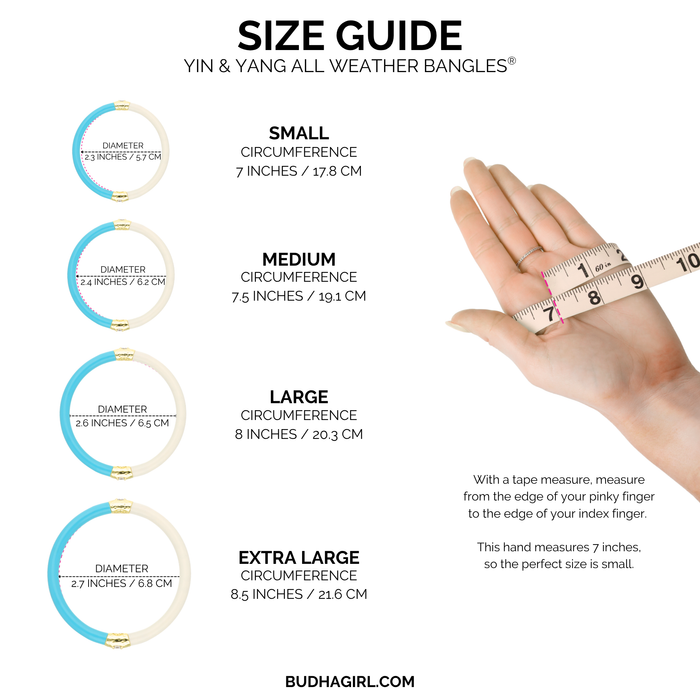 a hand holding a measuring tape